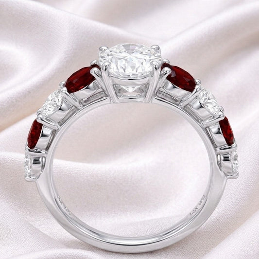 The Crimson Melody: 2.87ct Oval Moissanite & Red Accent Engagement Ring