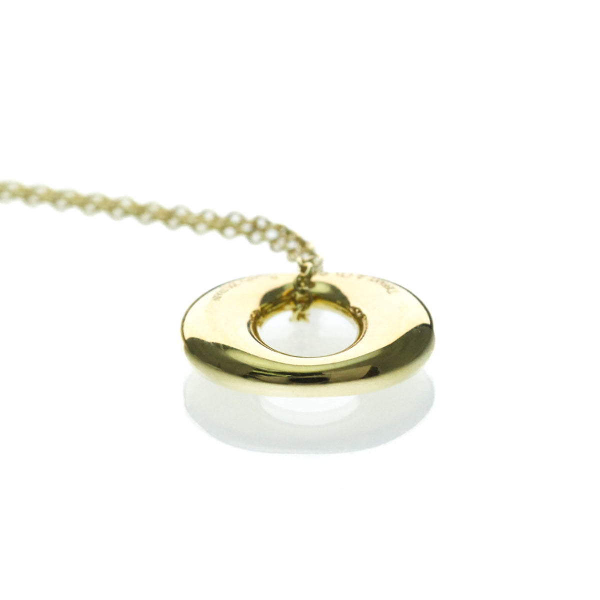 Tiffany Seviana · 18K Yellow Gold