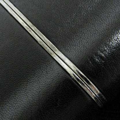 Yves Saint Laurent Opium · Leather