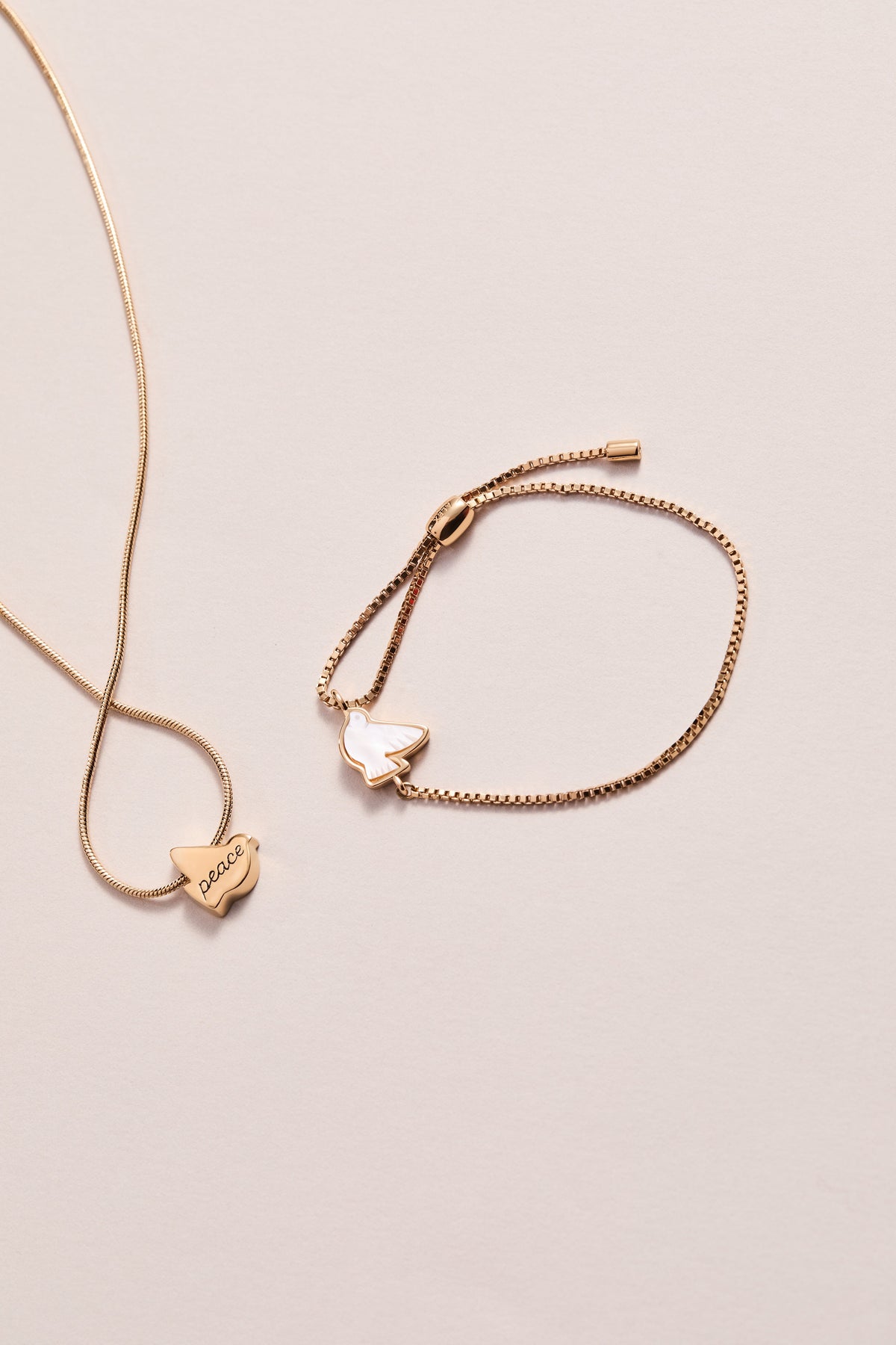 Dove 'Peace' Mother of Pearl Pull Chain Bracelet