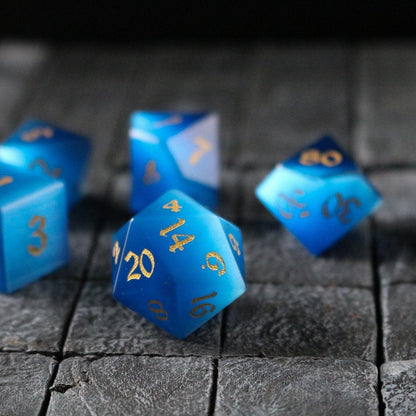Juego de dados DND tallados a mano con piedra ojo de gato azul oscuro