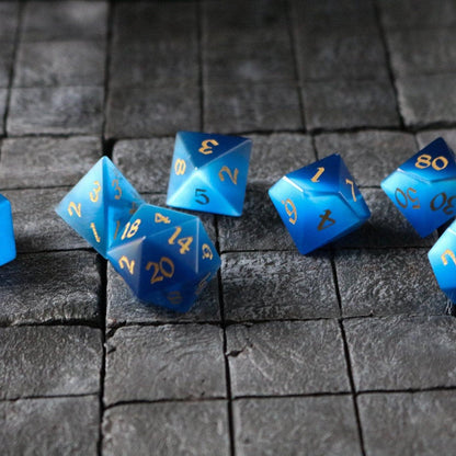 Juego de dados DND tallados a mano con piedra ojo de gato azul oscuro