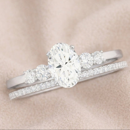 The Starlit Promise: 1.4ct Oval Moissanite Bridal Ring Set