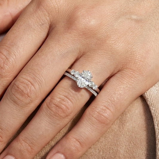The Starlit Promise: 1.4ct Oval Moissanite Bridal Ring Set