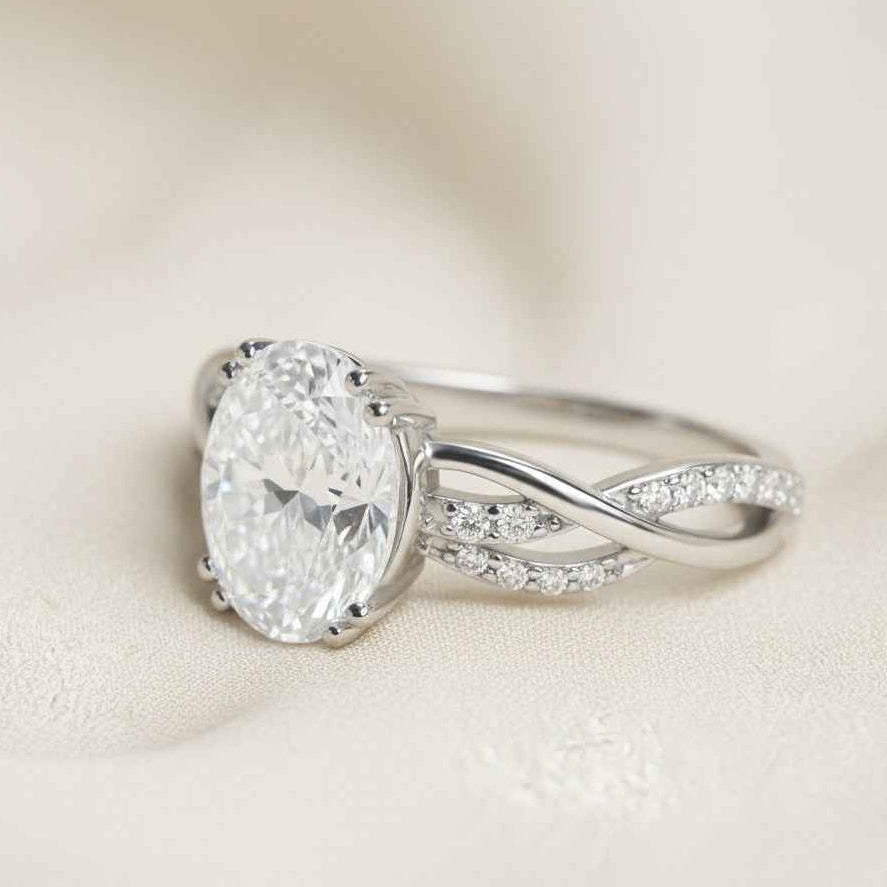The Interwoven Romance: 1.20ct Oval Moissanite Twist Engagement Ring