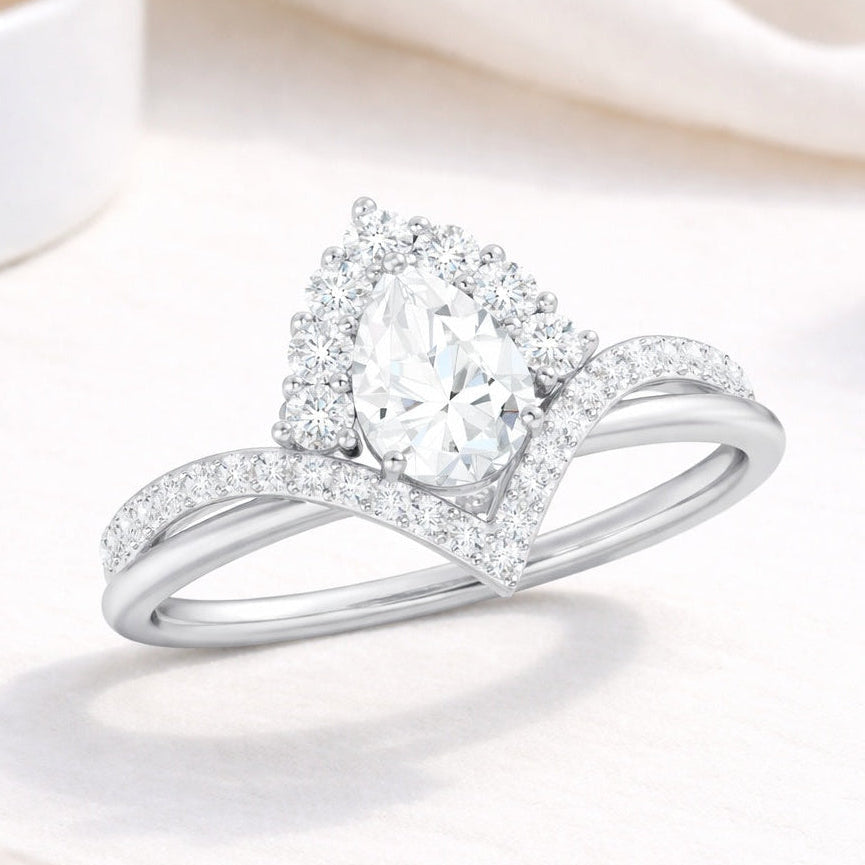 The Regal Teardrop: 1.56ct Pear Moissanite Crown Engagement Ring