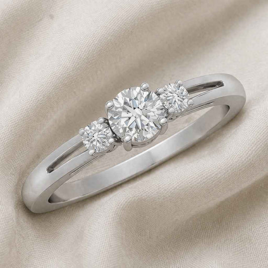 The Triad Glow: 0.7ct Round Moissanite Three-Stone Ring