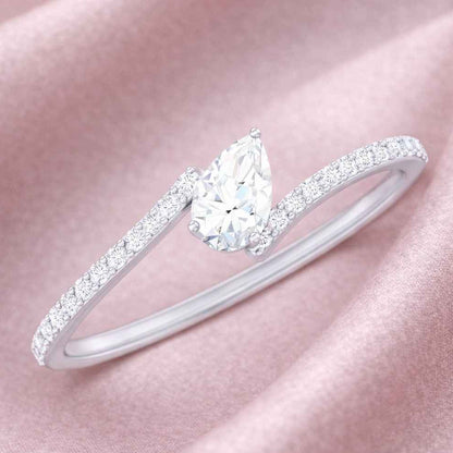 The Asymmetric Grace: Pear-Cut Moissanite Engagement Ring
