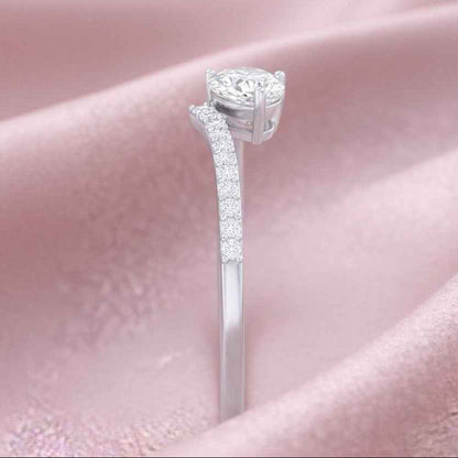The Asymmetric Grace: Pear-Cut Moissanite Engagement Ring