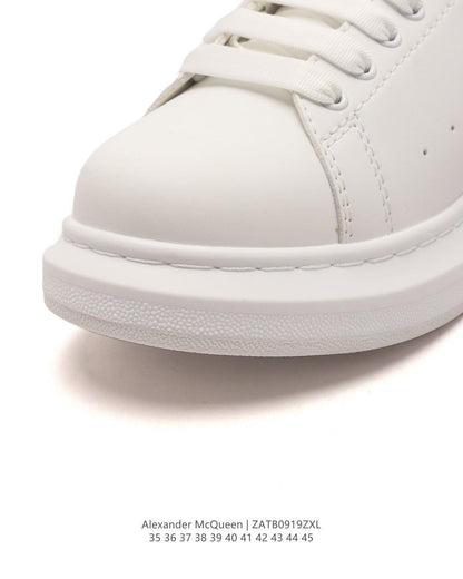 Alexander McQueen Sneakers White & Red | Luxury Fashion Statement