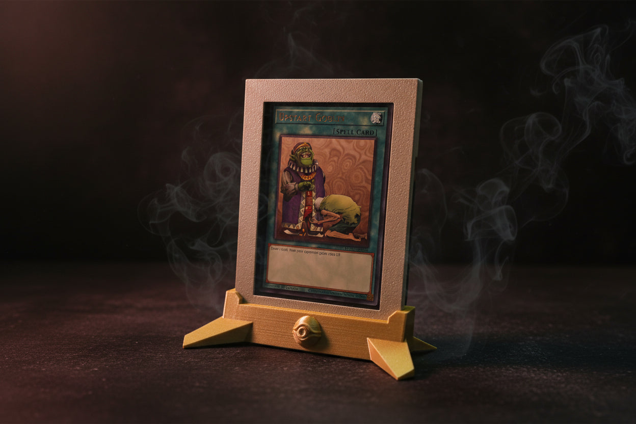 upstart goblin Card with a character illustration on a stand against a black background