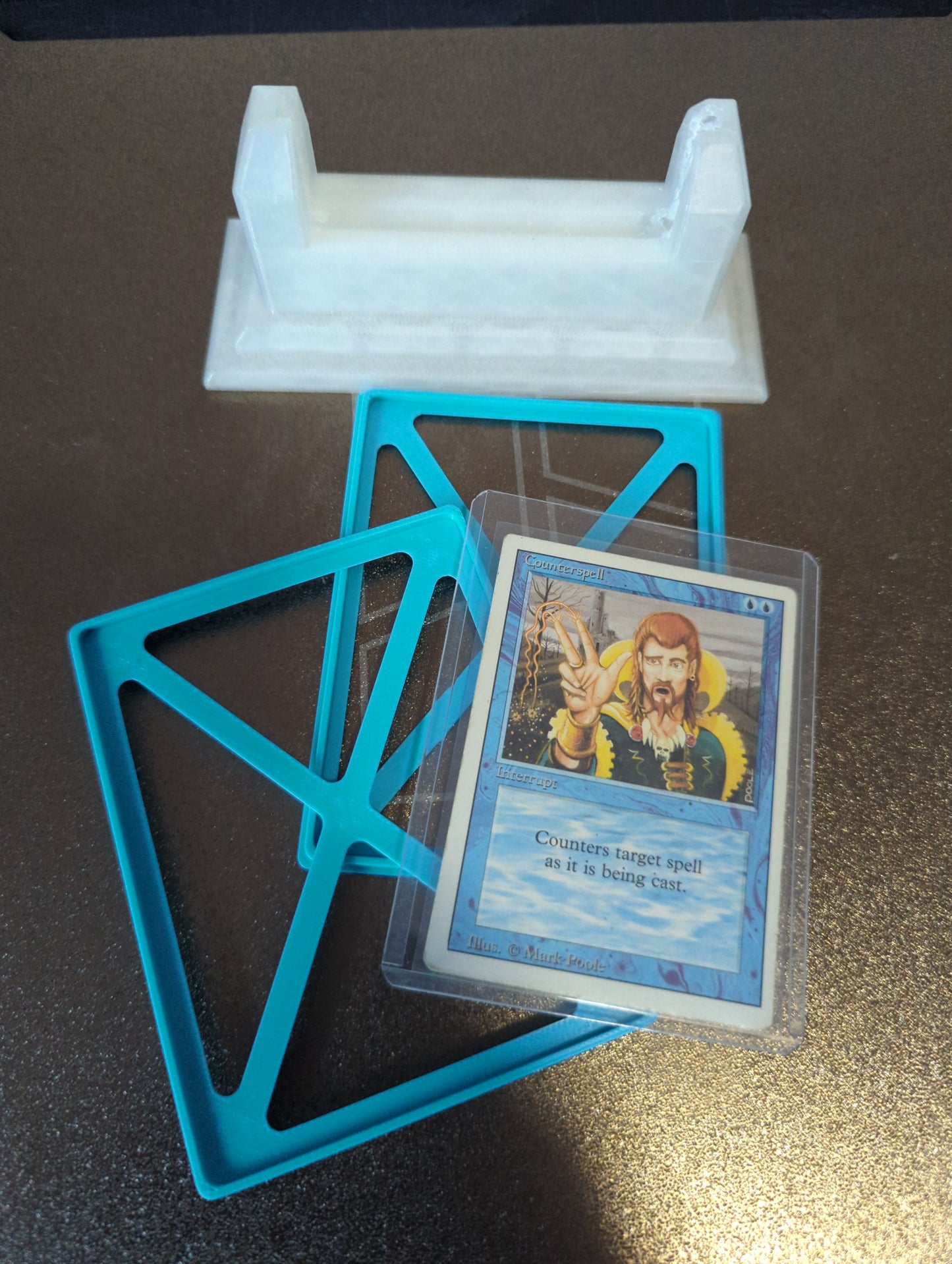 Experiment 003 — Counterspell Artifact Display Stand with Top Loader Case (Magic: The Gathering Revised Edition)