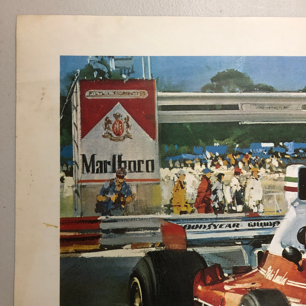Niki Lauda on 1975 Ferrari 312T by Michael Turner Poster